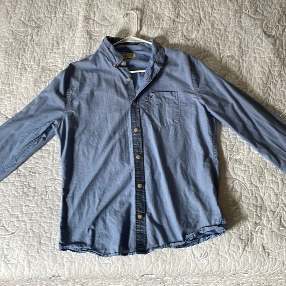 Lightly Worn Medium Light Blue Men’s Hollister Button Down shirt.